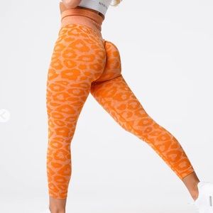 NWOT NVGTN burnt orange leopard leggings medium